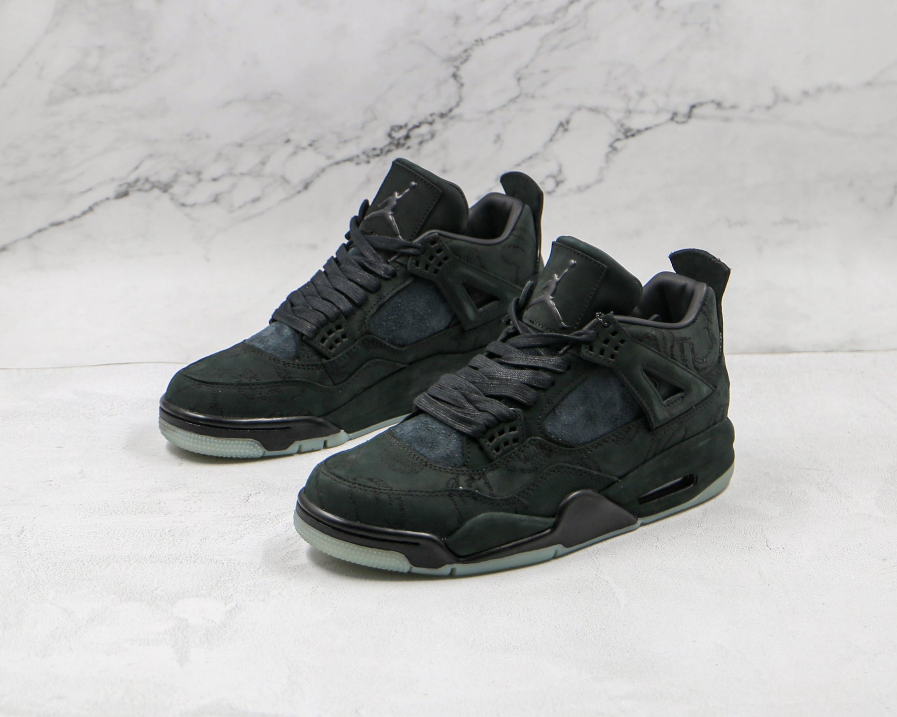 Jordan 4 Retro Kaws Black